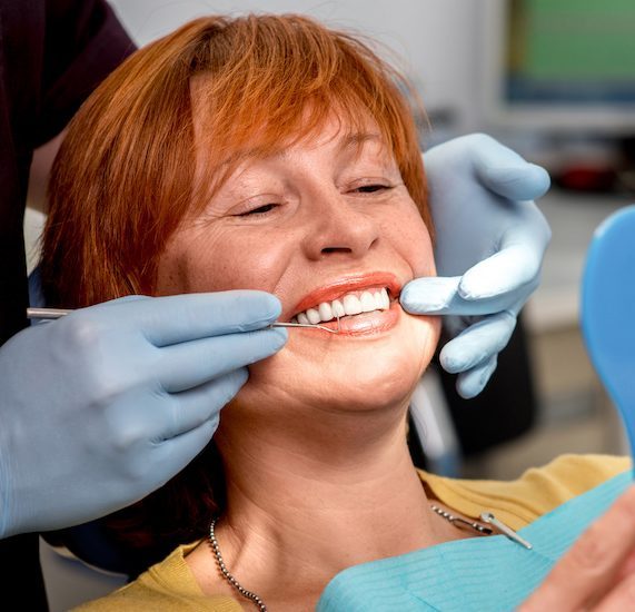 Senior woman in the dental office.